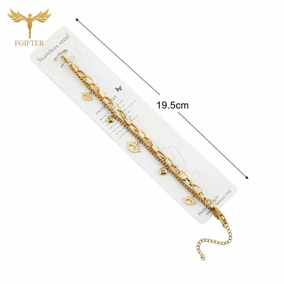 Goldenes Charm-Armband mit Augen- und Kristalldetails