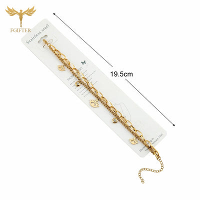 Goldenes Charm-Armband mit Augen- und Kristalldetails