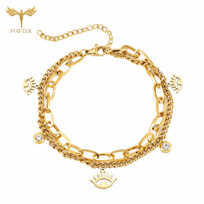Goldenes Charm-Armband mit Augen- und Kristalldetails