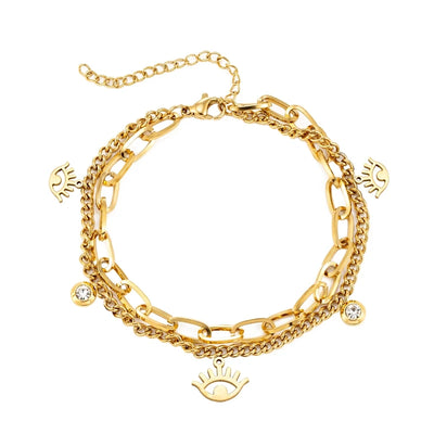 Goldenes Charm-Armband mit Augen- und Kristalldetails